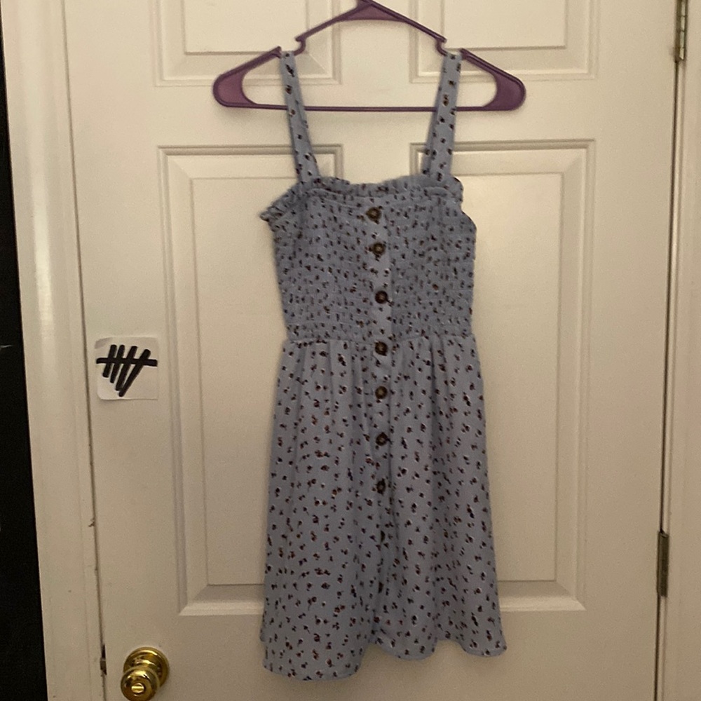 Light blue with flour patterns all around scrunchie top flowy bottom with button